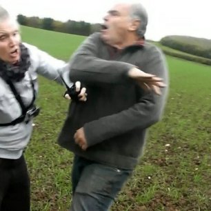This is the dramatic moment a female hunt saboteur clashed with an angry man as she tied to monitor an event - and was left hospitalised with a cut to the face. See NTI story NTIHUNT; Extraordinary footage shows the woman and a colleague having a furious row with the male in a field. The West Midlands Hunt Saboteurs members claim they were trying to monitor members of the Warwickshire Hunt when the incident happened on Thursday (9/11) in Birdingbury, Warwicks.